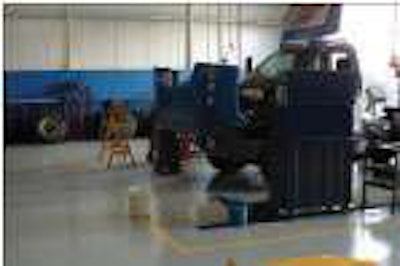 Overhead oil lines and air hoses were installed in the bays.