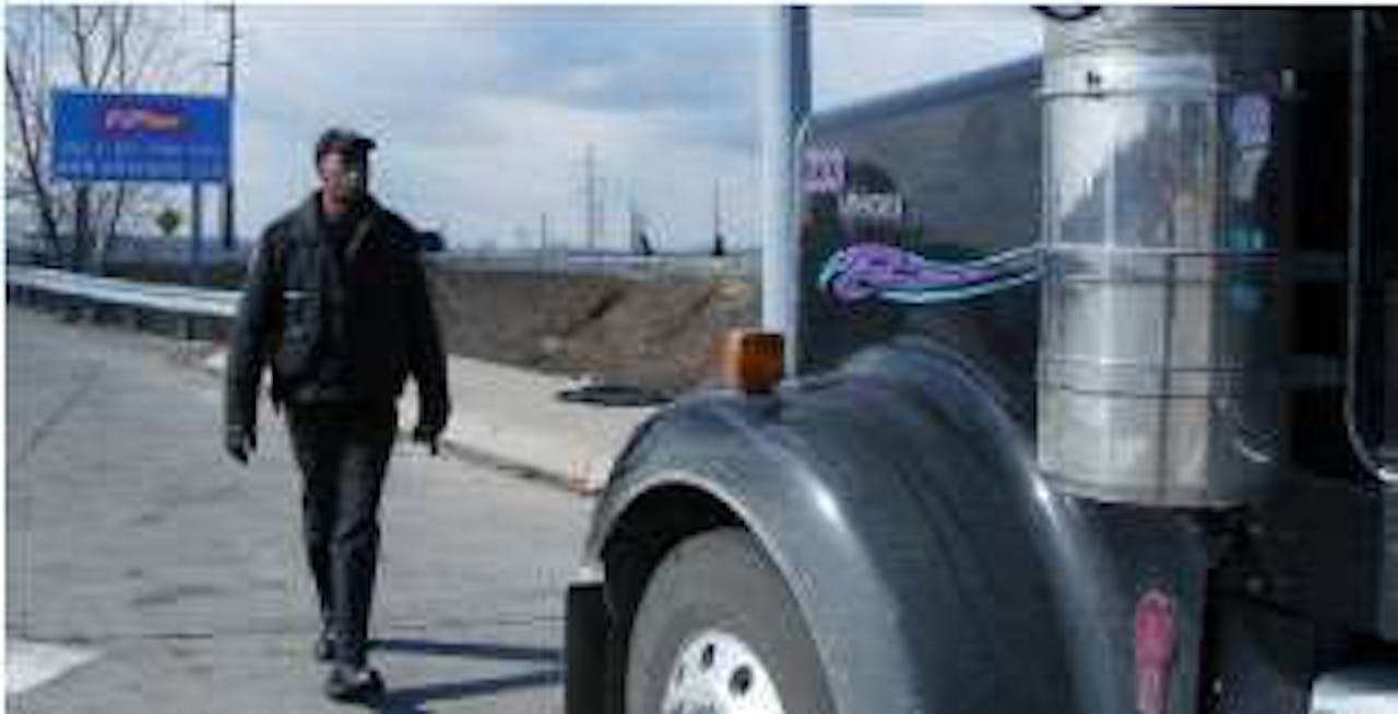 The Pennsylvania Turnpike's East-West route (Interstates 76/276) and its Northeast Extension (I-476) intersect with the toll-free southern sections of I-476 at the Mid-County Interchange in Norristown, Pa. This is a favored location for truck inspections in Eastern Pennsylvania because of a high volume of truck traffic. Trooper David Hodges of the Pennsylvania State Police pulled this truck aside after the driver paid his toll.