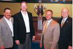Andrews Logistics received the 2009 Outstanding Performance Trophy from the National Tank Truck Carriers association, NTTC’s top safety prize. Shown from left are Griff Odgers, ALI vice president of safety and risk management; J. Darron Eschle, ALI chairman and CEO; Greg Hewitt, president of Heil Trailer International, sponsor of the award and trophy; and John Conley, NTTC president.