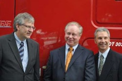 Top Freightliner executives were on hand as U.S. Express CEO Max Fuller received his 50,000th Freightliner in a ceremony on Aug. 5. Pictured (left to right) are Martin Daum, president and CEO of Daimler Trucks North America; Fuller; and Mark Lampert, senior vice president sales & marketing for Daimler Trucks North America.
