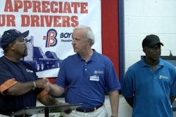 Boyd Bros. President Richard Bailey (middle), congratulates drivers Virgil Shell (left) and Dennis Howard (right) for safely reaching the two-million-mile mark for the company.