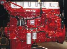 The crankcase ventilation system for Mack’s MP8 engine shows: (1) the engine outlet for crankcase gases, (2) the separator where crankcase gas is condensed, (3) the condensed oil return to the crankcase and (4) the decondensed crankcase gas that is returned for combustion.