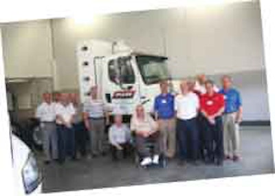 P.A.M. has established itself as an early adopter for new technology. Here, Tapp and his team pose with one of the fleet’s first compressed natural gas-powered tractors.