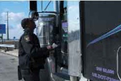 The Pennsylvania Turnpike’s East-West route (Interstates 76/276) and its Northeast Extension (I-476) intersect with the toll-free southern sections of I-476 at the Mid-County Interchange in Norristown, Pa. This is a favored location for truck inspections in Eastern Pennsylvania because of a high volume of truck traffic. Trooper David Hodges of the Pennsylvania State Police pulled this truck aside after the driver paid his toll.