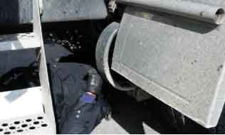 Safety inspections need to be carried out safely, so inspectors carry wheel chocks since service brakes must be checked with the parking brake off. Creepers allow them to move freely under tractor and trailer to check items such as brakes and suspensions.