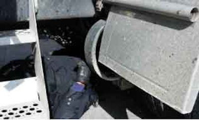 Safety inspections need to be carried out safely, so inspectors carry wheel chocks since service brakes must be checked with the parking brake off. Creepers allow them to move freely under tractor and trailer to check items such as brakes and suspensions.