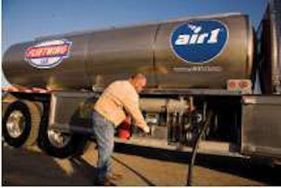 A driver for Yara North America dispenses diesel exhaust fluid into a fleet’s tank. A fleet with 80-160 trucks likely would need a 5,000-6,000-gallon DEF tank.