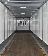 Nussbaum Transportation’s dual-purpose dry van trailer, designed with a 35,000-pound floor rating, can be loaded with heavy products typically requiring a flatbed trailer and reloaded with finished products requiring a dry van.