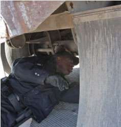 Hodges marks every pushrod, then checks brake-stroke as the driver applies the brakes.
