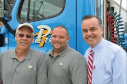 Dave Ward, right, with employees Tom Gerwig, left, and Craig Powers, says Price-Tran drivers do all of the unloading and reloading of freight themselves at the company’s two terminals.