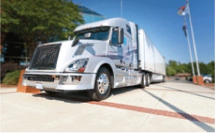 The mid-level trim tractor for the North Carolina test drive was a 2013 Volvo 670 painted in gleaming Dupont Glacier White.