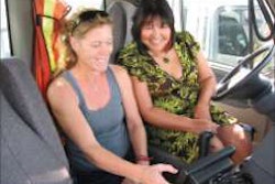 Dorothy Vankoughnett, IT manager and controller for Berry & Smith Trucking, reviews ECM data with Dina Elder, the company’s safety/driver liaison.