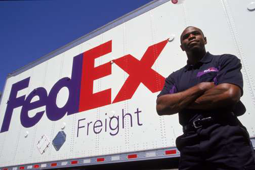 FedEx Freight trailer with driver