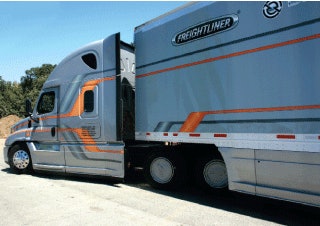 The Freightliner Cascadia used for the Evolution of Economy Tour was a 2014 model with trailer aerodynamic aids simulating available products.