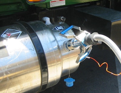 Liquid natural gas being pumped into an LNG tank.