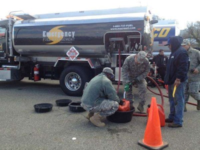 Tanker trucks distribute fuel to residents in New York who were affected by Hurricane Sandy.