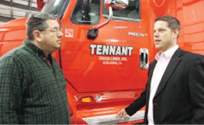 Aaron Tennant (right), president of Tennant Truck Lines, says investing in technology to reduce waste and improve efficiencies has paid big dividends for the company and its drivers.