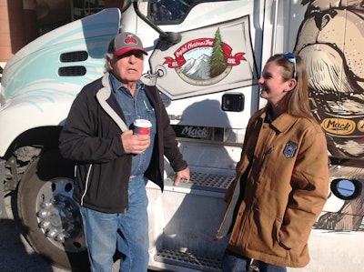 Sen. Ben Nighthorse Campbell, official driver of the Mack Pinnacle bound for the U.S. Capitol, shares his experiences as a truck driver with Kandy Kilbreth, a U.S. Forest Service Job Corps student.