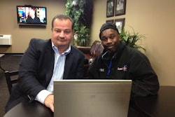John Elliott, president of Load One, with a driver. Load One uses several cloud-based software systems and has a completely virtual IT network.