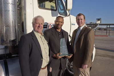 Richard Bailey, Boyd Bros. president, Cory Gilliard, intermodal director, and Chris Cooper, chief operations officer, accept the 2013 CCJ Innovator of the Year award.