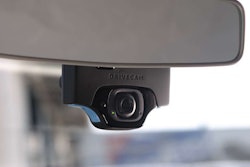 DriveCam’s system uses a window-mounted recording device that captures forward and cab-facing video.