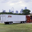 XTRA Lease truck parked on grass