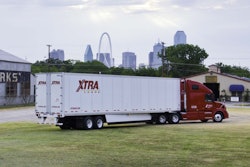 XTRA Lease truck parked on grass