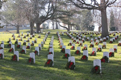 Volunteers in the trucking industry bring wreaths for the annual ceremony at Arlington National Cemetery, shown here in Dec. 2012