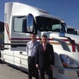 Company owner Raul Monroy Reus (right) and his son Raul Monry Otero, stand in front of one of the company’s new Volvo VNL tractors equipped with the I-Shift transmission.