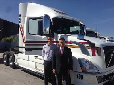 Company owner Raul Monroy Reus (right) and his son Raul Monry Otero, stand in front of one of the company’s new Volvo VNL tractors equipped with the I-Shift transmission.