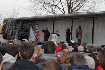 Volunteers ranged from uniformed service members and gray-haired veterans to the young girl pictured here. Teaching our children the value of freedom is a core part of Wreaths Across America’s mission.