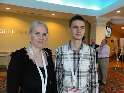 Milana Yuriychuck (left) and Paul Ilin attend the Sylectus user conference to grow their family-owned expedite business, Storm Logistics