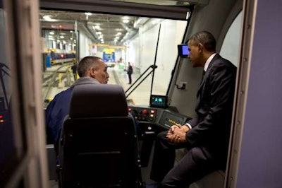 President Obama gets an inside look at a light-rail commuter train in St. Paul, Minn., Wednesday, before announcing a new round of TIGER grants. (White House photo)
