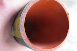 Due to an electrochemical reaction, coolant hoses tend to deteriorate from the inside out, shedding material into the liquid. To inspect a coolant hose, use a finger and thumb to feel for sponginess or weak spots.