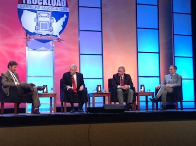 A panel of truckload fleet executives discussed the possibility of paying drivers by the hour.