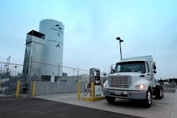 A Ryder CNG truck refuels.