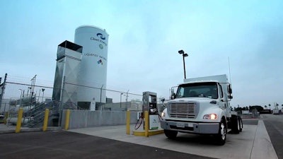 A Ryder CNG truck refuels. (Ryder System photo)