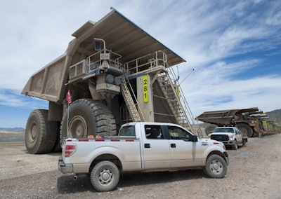 F-150 X1 prototype is dwarfed by the massive 400-ton capacity Liebherr T282T off-road dump trucks used at the Barrick Cortez gold mine in Nevada.
