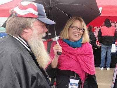 FMCSA Administrator Anne Ferro, in happier times, visits with an OOIDA member at the association’s 40th anniversary “Heart of America Trucking Show” last fall. OOIDA is now calling for Ferro to step down.