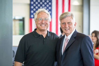 Steve Williams (left), founder and CEO of Maverick Transportation, LLC, with Arkansas Governor Mike Beebe