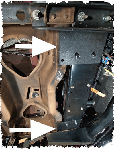 Steel extension plates were made to attach the universal winch mount to the Dually frame rails.