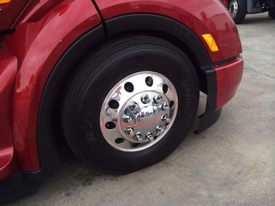 Peterbilt engineers reduced as many drag-inducing open spaces as possible on the Model 579 EPIQ, as evidenced by extremely tight tolerances around the steer axle wheels.