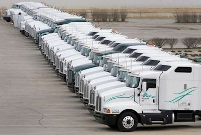 Photo from Tulsa World. Arrow Trucking suddenly and without notice closed in December 2009, leaving trucks, trailers, cargo and drivers stranded nationwide.