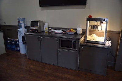 WTI included two refreshment stations in the driver lounge, complete with a popcorn maker, hot dog machine, microwave and more. Another not pictured here features a soda fountain.