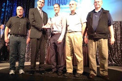 Truck Parts & Service Editor Lucas Deal presents Six Robblees’ with the 2015 Distributor of the Year award.