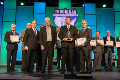 Paramount Freight Systems director Trent Dye accepts the Best Fleets to Drive For award in the owner-operator category at the Truckload Carriers Association’s annual convention in March in Grapevine, Texas.