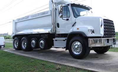 The SD’s hood pivots forward easily, with all inspection points on the Cummins and Detroit engines accessible from ground level.