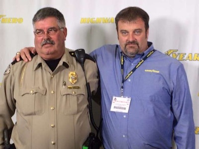 Clint Blackburn, right, and jailer Darrell Herndon have become good friends since Blackburn saved Herndon from being strangled by a prisoner. “I call him brother Darrell,” Blackburn said.
