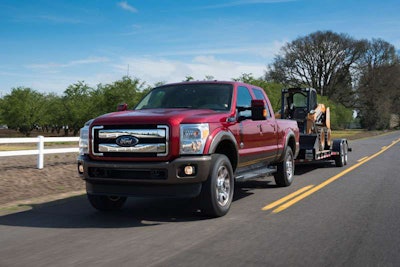 A safe towing setup requires the proper use of chains, straps and binders as well as a W-D hitch.