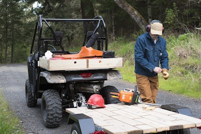 Towing a small trailer is easy work for the Pioneer 500. We built our own “cargo box” to handle chainsaws, fuel and gear.
